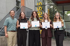 Prof. Dr. Fernando Fastoso celebrates with his students who received the Beta Gamma Sigma award