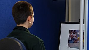 Picture of Facereaeder and Person sitting in front of it