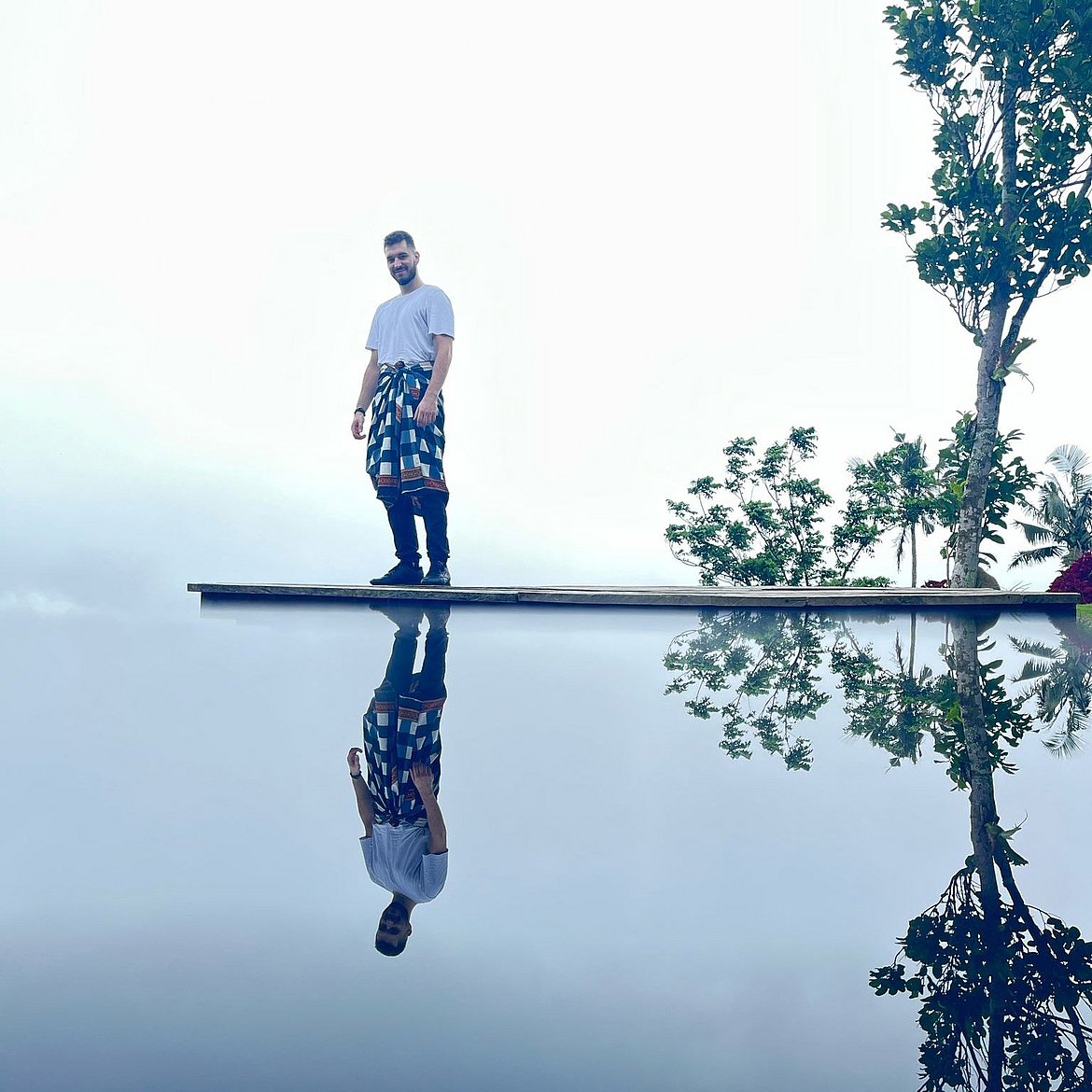 Niko Geljic at a lake in Asia